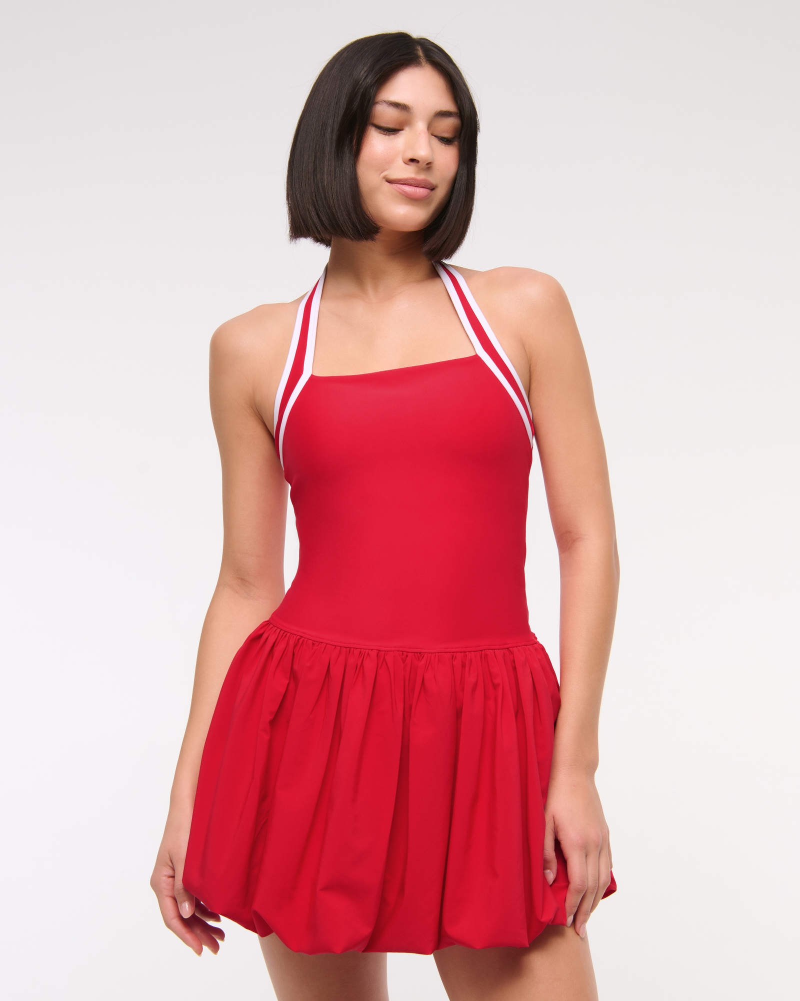 YPB motionTEK Halter Bubble Hem Mini Dress