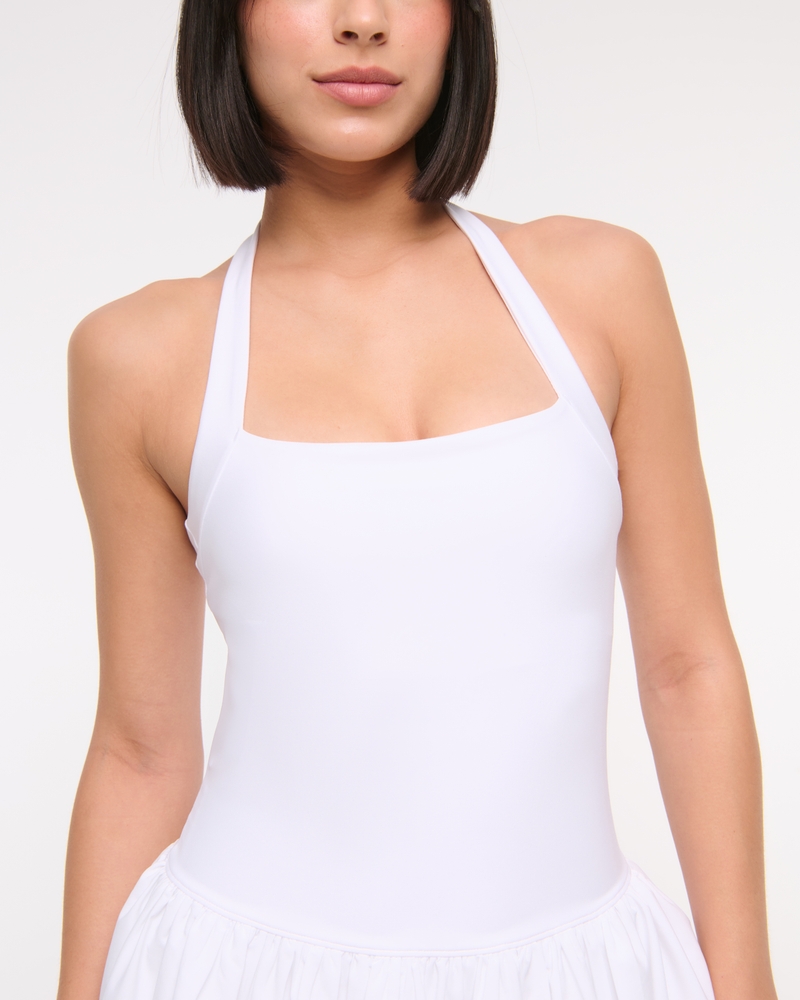 YPB motionTEK Halter Bubble Hem Mini Dress