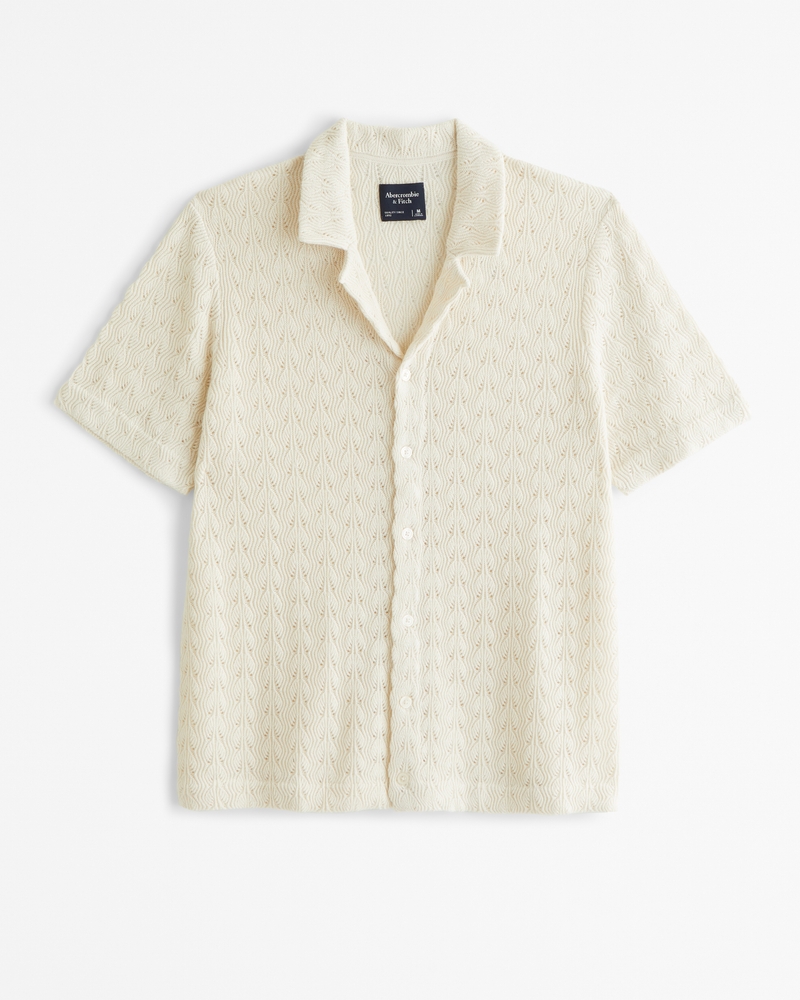 Polo style pull texture et boutonne en maille