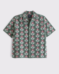 Polo estilo suéter abotonado y estilo croché floral