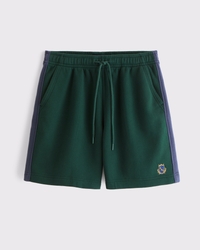 Shorts felpati con stemma del logo