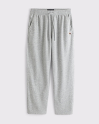 Sweatpants van French terry met logo en open zoom