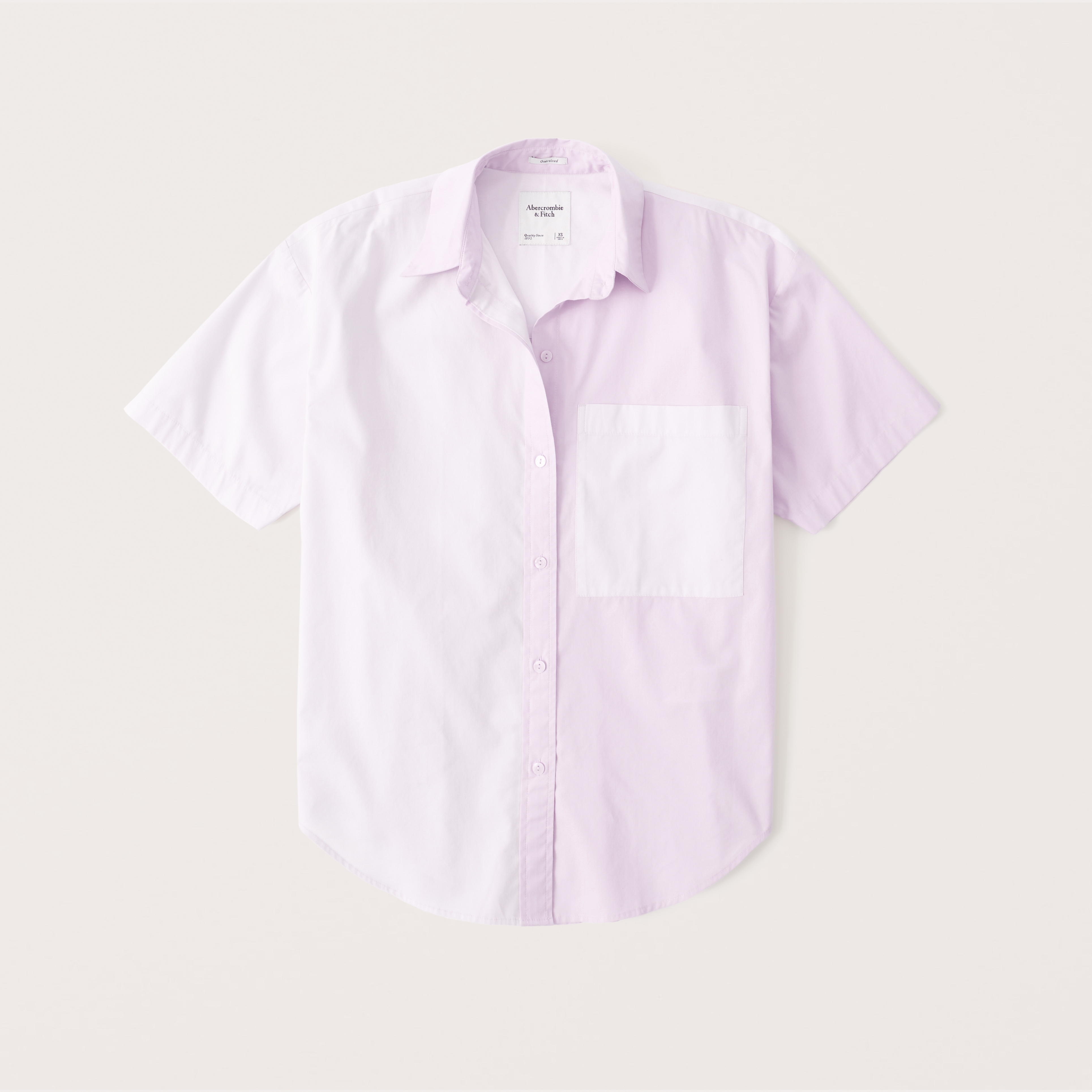 white and pink button up shirt