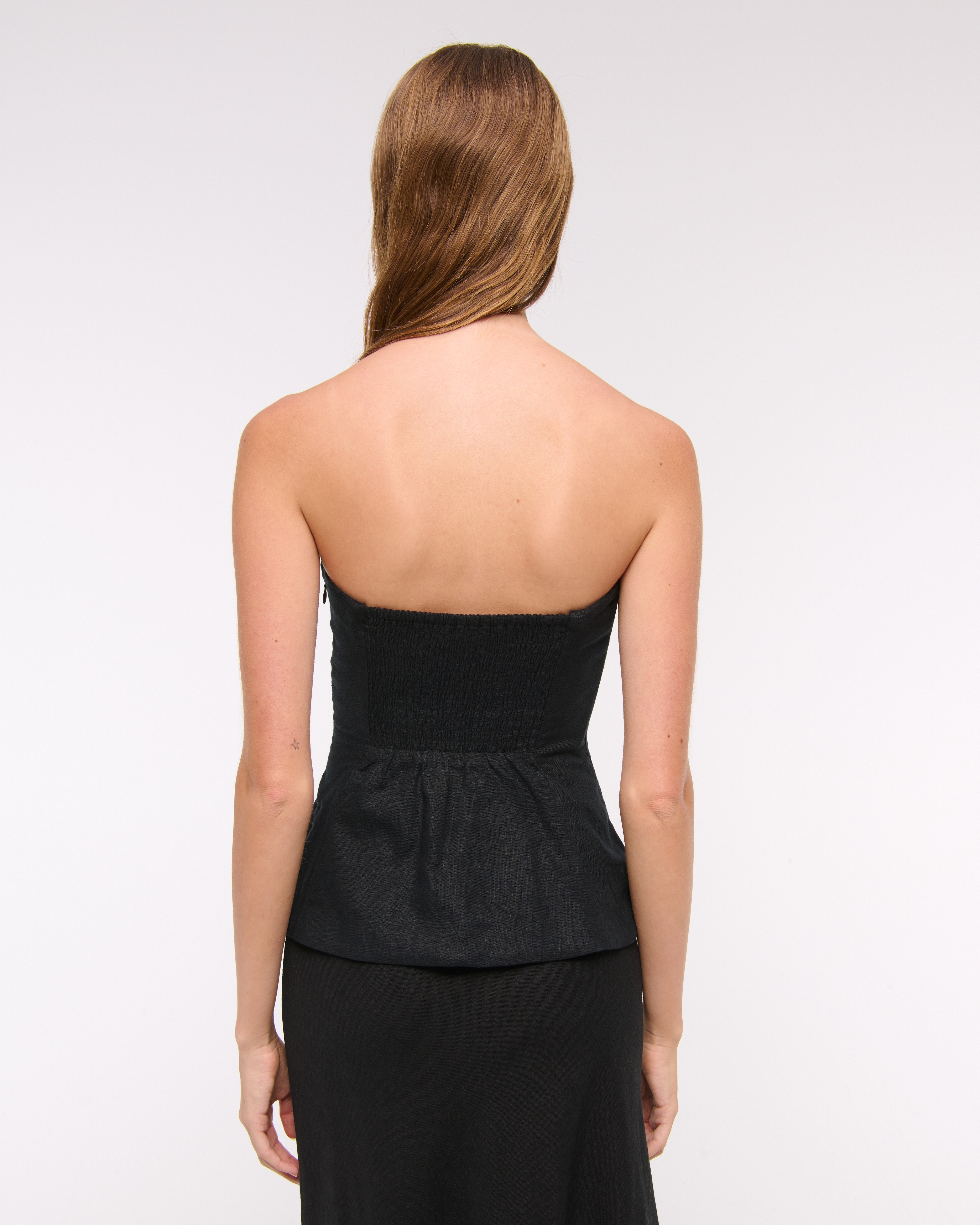 black strapless peplum top