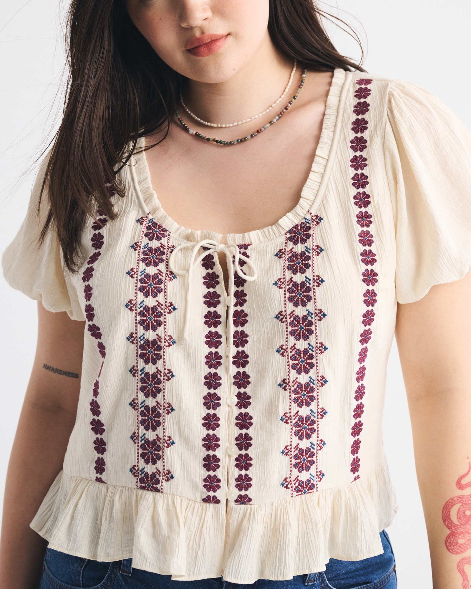 Embroidered Peplum Puff Sleeve Top