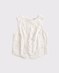 Top tipo shell bordado, con lazo en la espalda