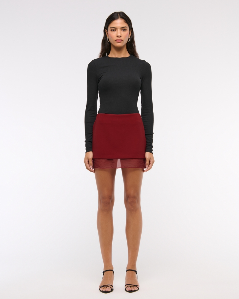 Mid Rise Sheer Hem Mini Skort