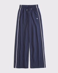 Pantaloni in spugna con icona e gamba larga