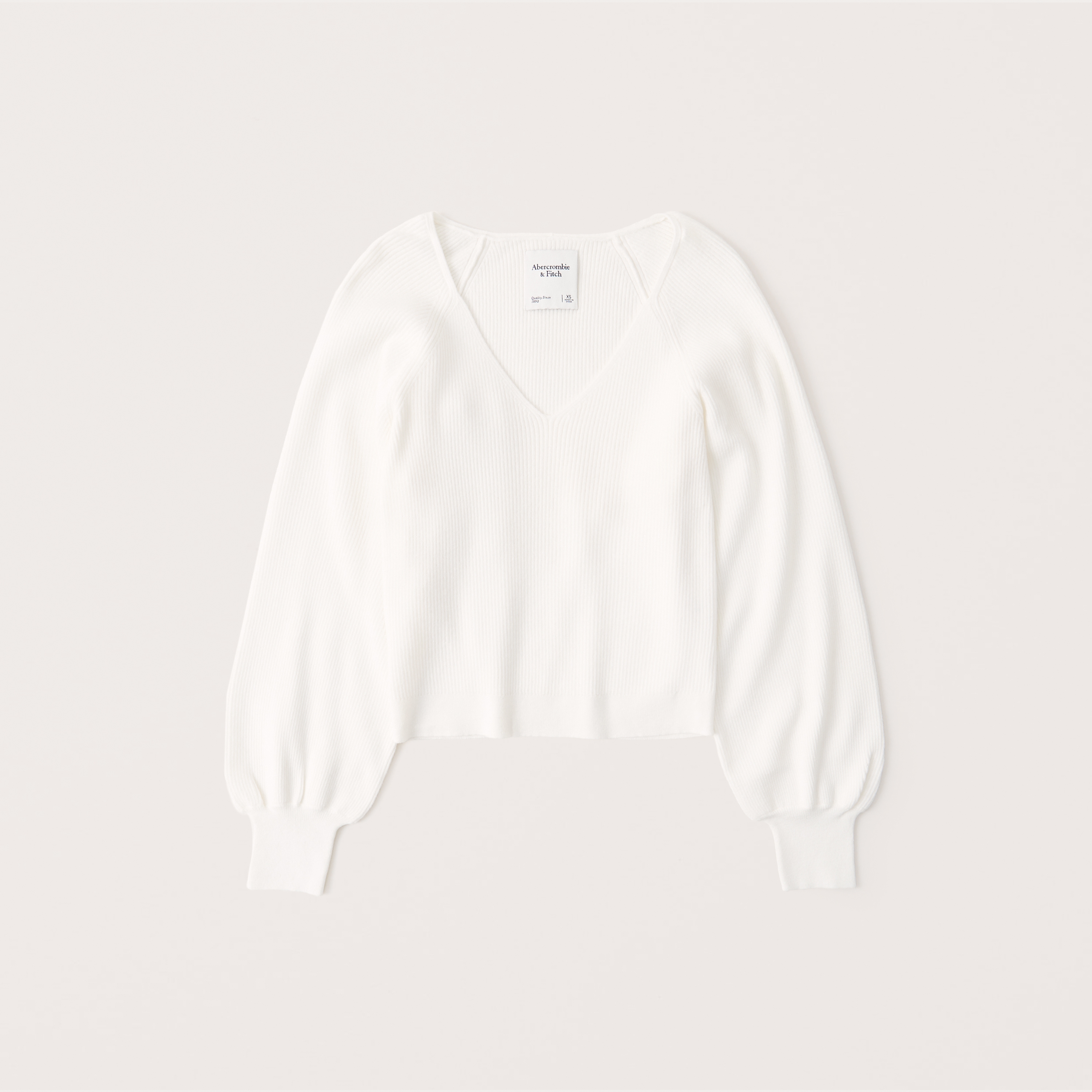white sweater