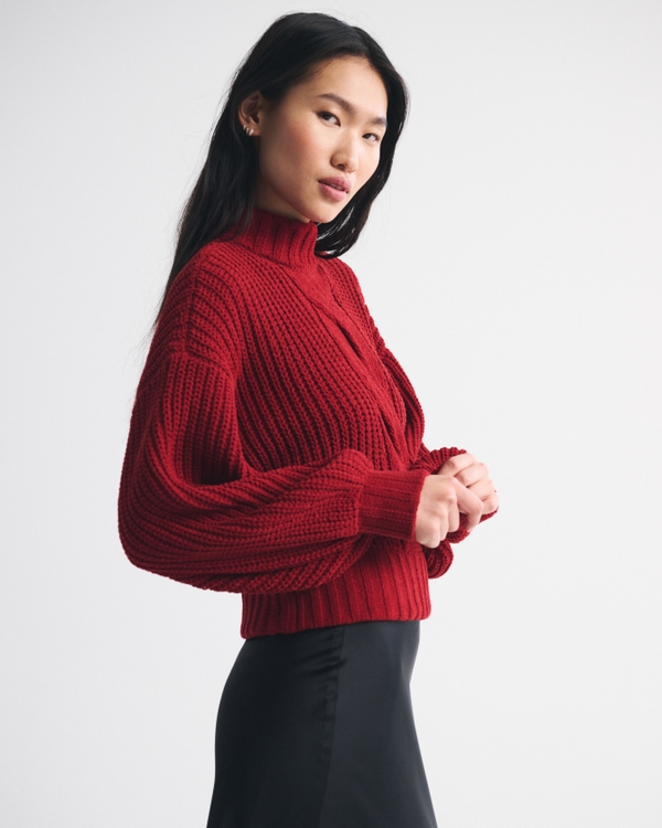 Pull à col montant en maille torsadée