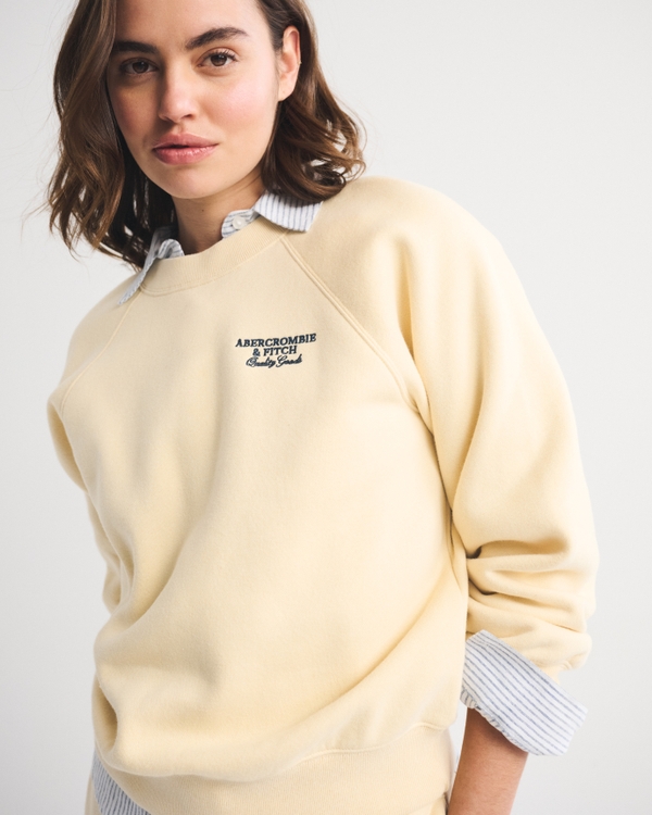 Logo Raglan Classic Sunday Crew<br/>