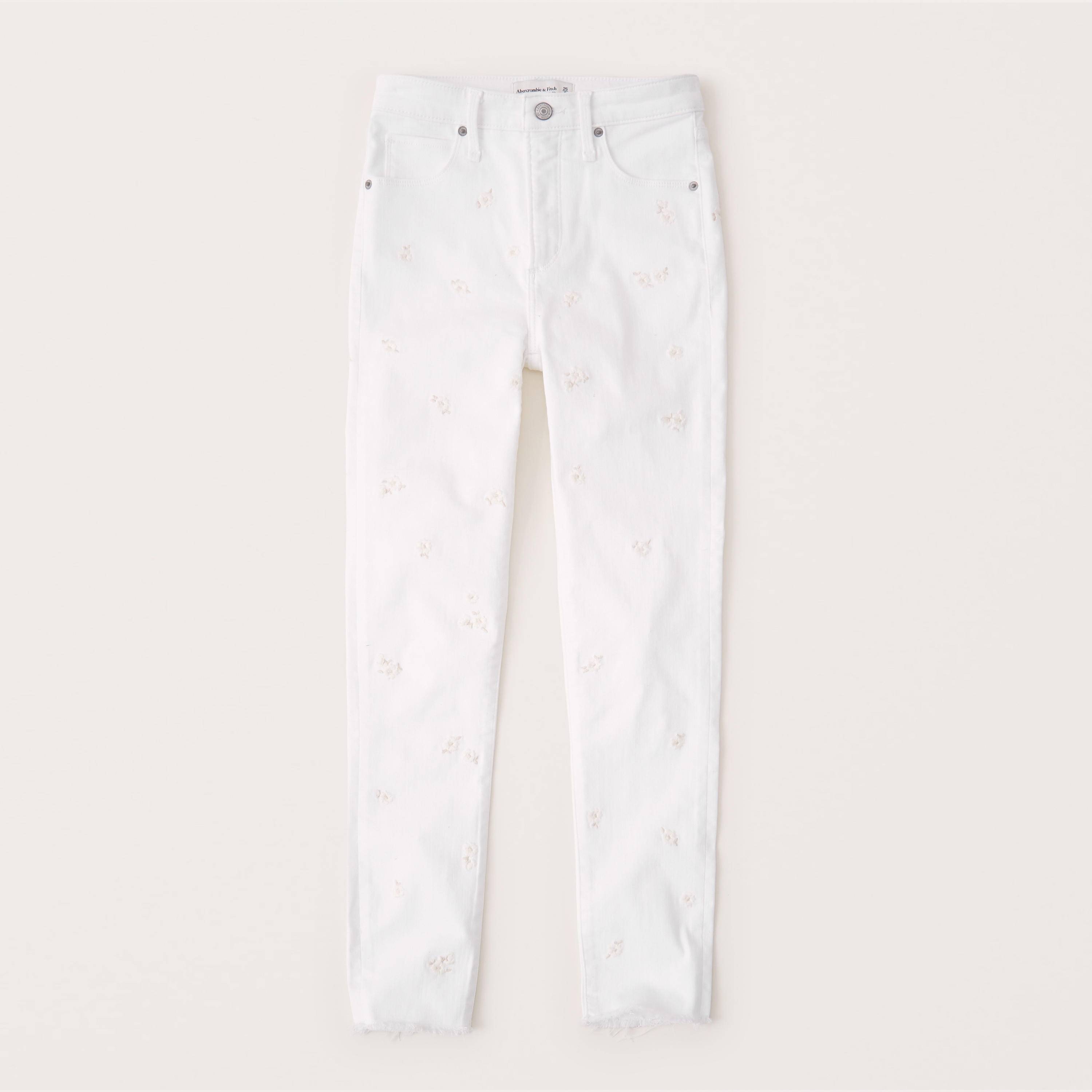 white embroidered jeans
