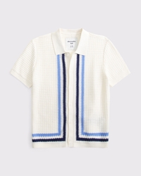 polo tipo suéter abotonado