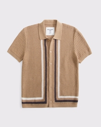 polo tipo suéter abotonado