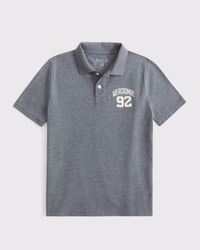 Polo de piqué con logo