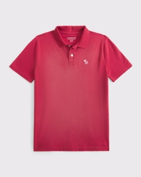 polo corto de piqué con ícono lavado