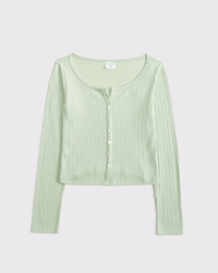 camiseta abotonada de manga larga