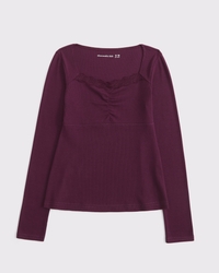 top babydoll de manga larga con ribete de encaje