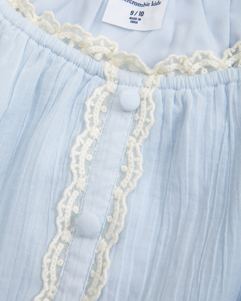 long-sleeve lace-trim embellished top