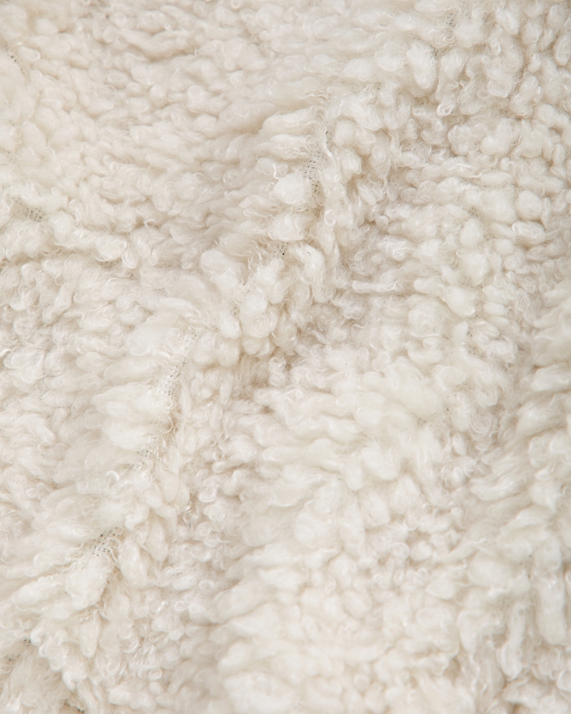 faux fur-lined vegan leather bomber jacket