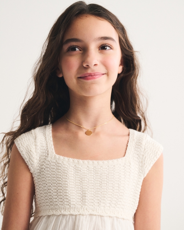 short-sleeve babydoll sweater