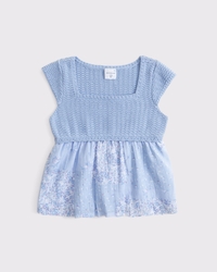 Suéter babydoll de manga corta