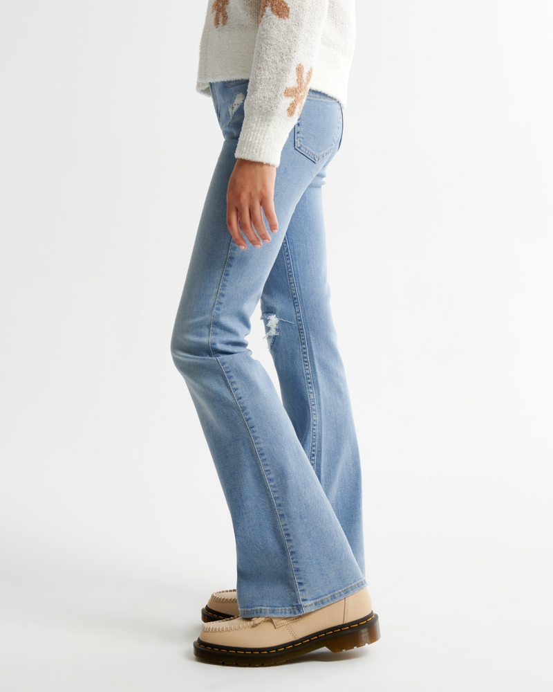 Bershka Petite clean flare jeans in light blue
