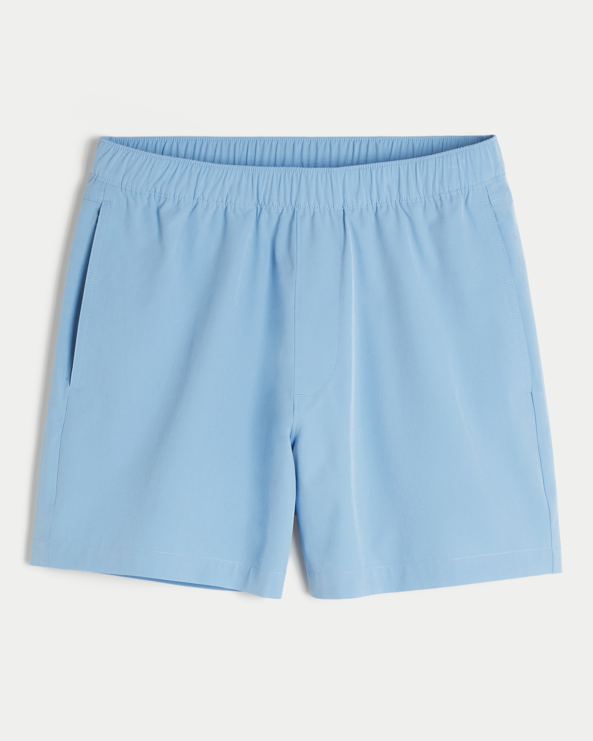 Мужские шорты Hollister Mid-Thigh Hybrid Active, цвет: Светлый синий — фото 1