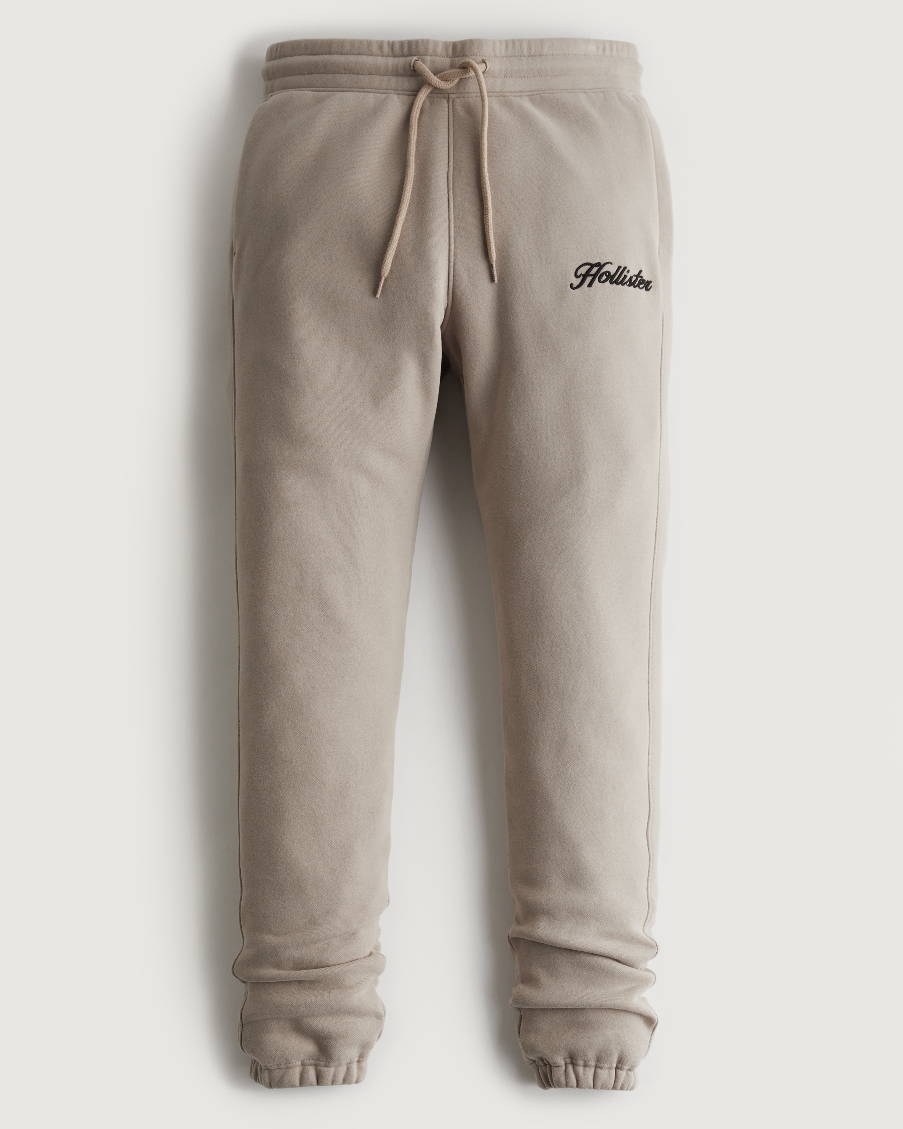 tan stacked sweats