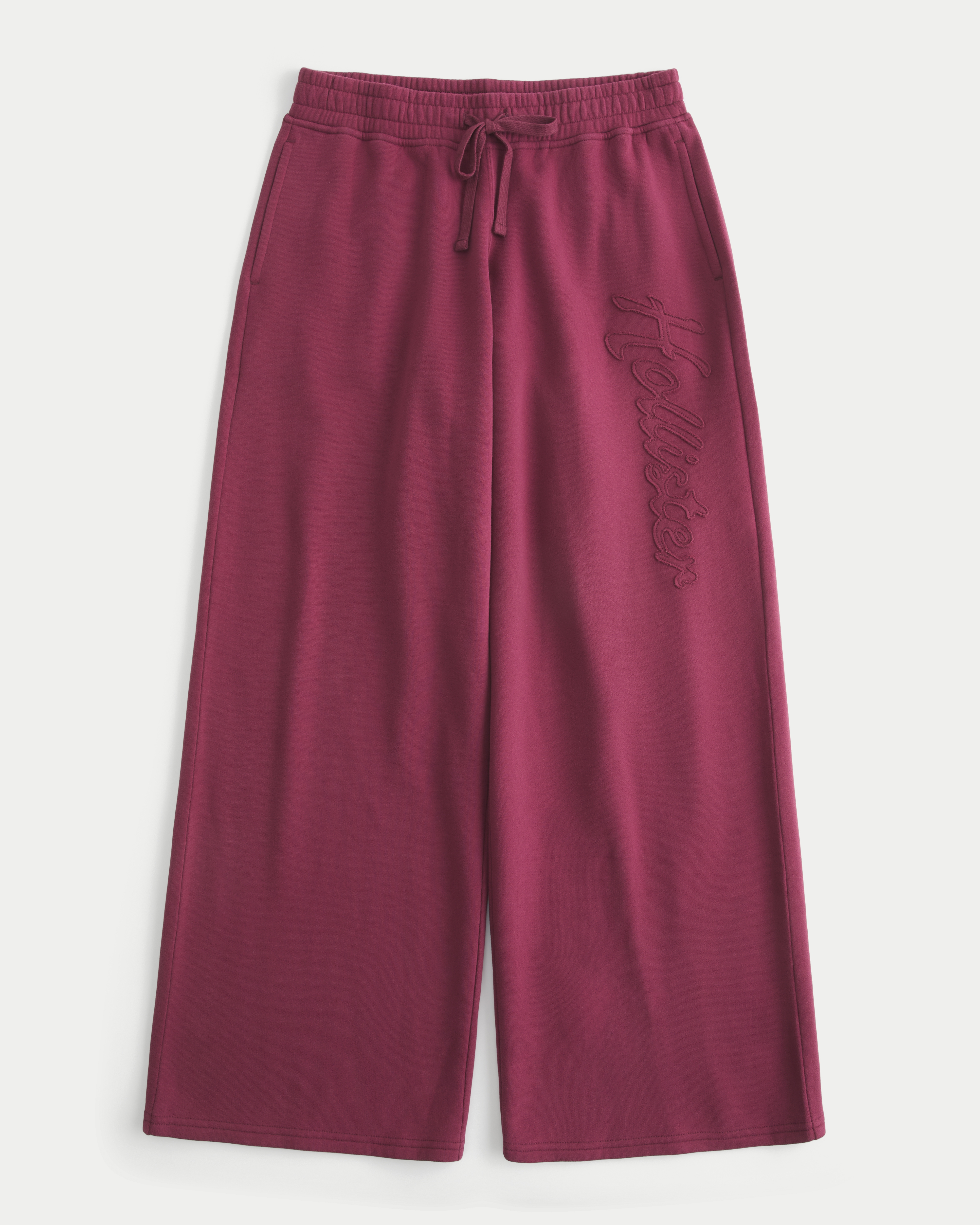 Женские брюки Hollister Low-Rise Logo Graphic Baggy Sweatpants, цвет: Бордовый