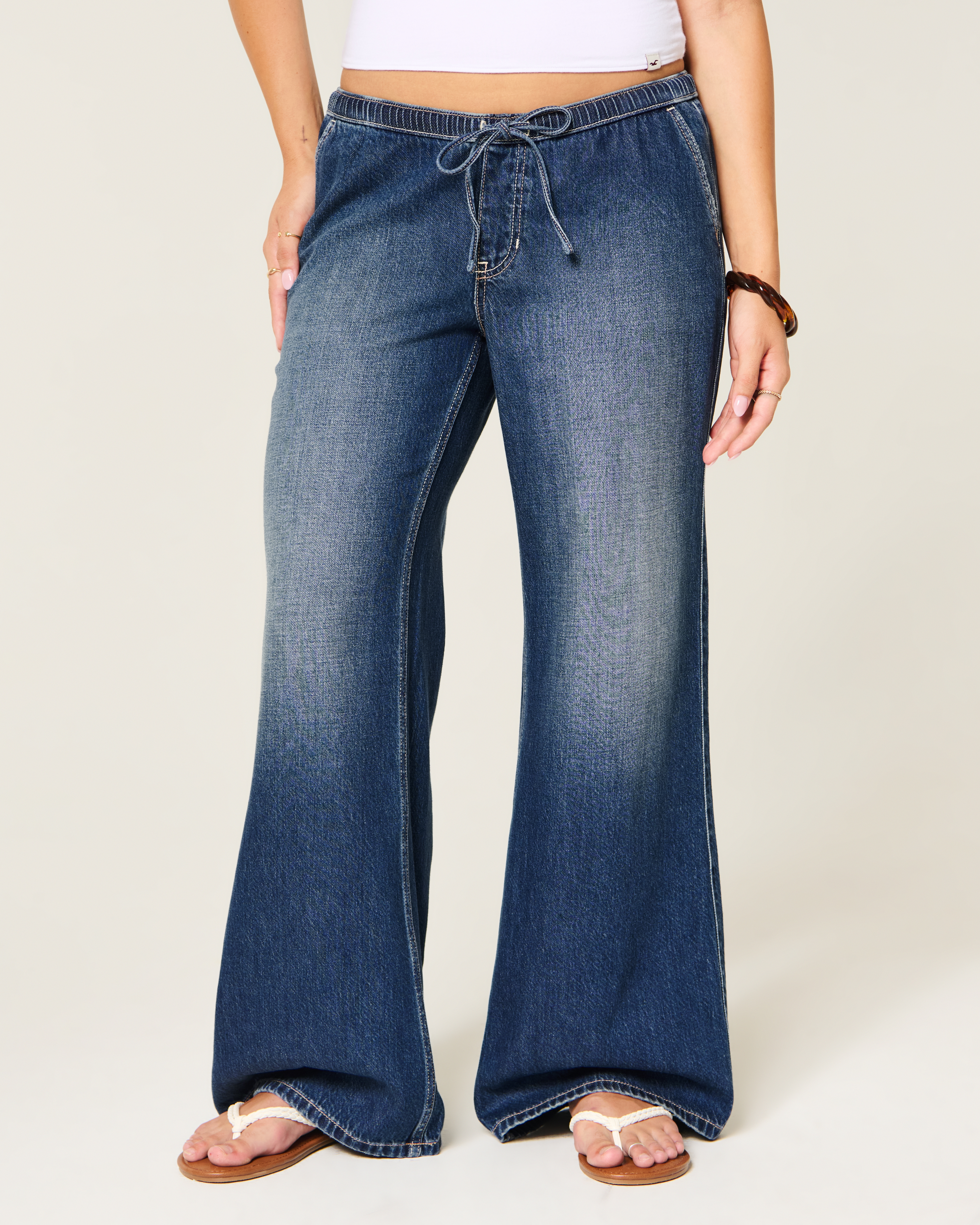 Женские джинсы Hollister Ultra Low-Rise Drapey Pull-On Wide-Leg, цвет: Тёмная варка — фото 3