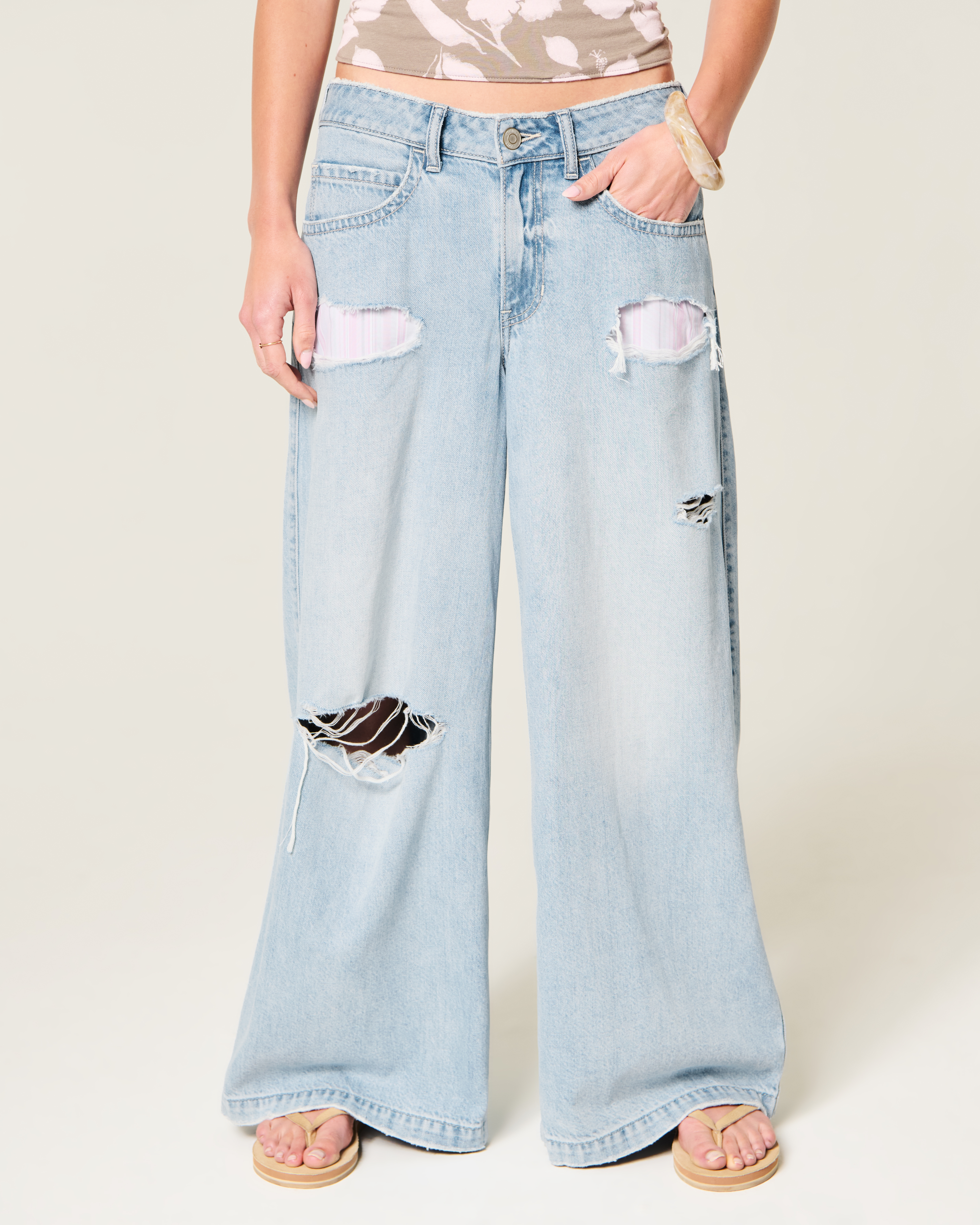Женские джинсы Hollister Ultra Low-Rise Distressed Floral Graphic Drapey Beyond Baggy, цвет: Светлый — фото 3