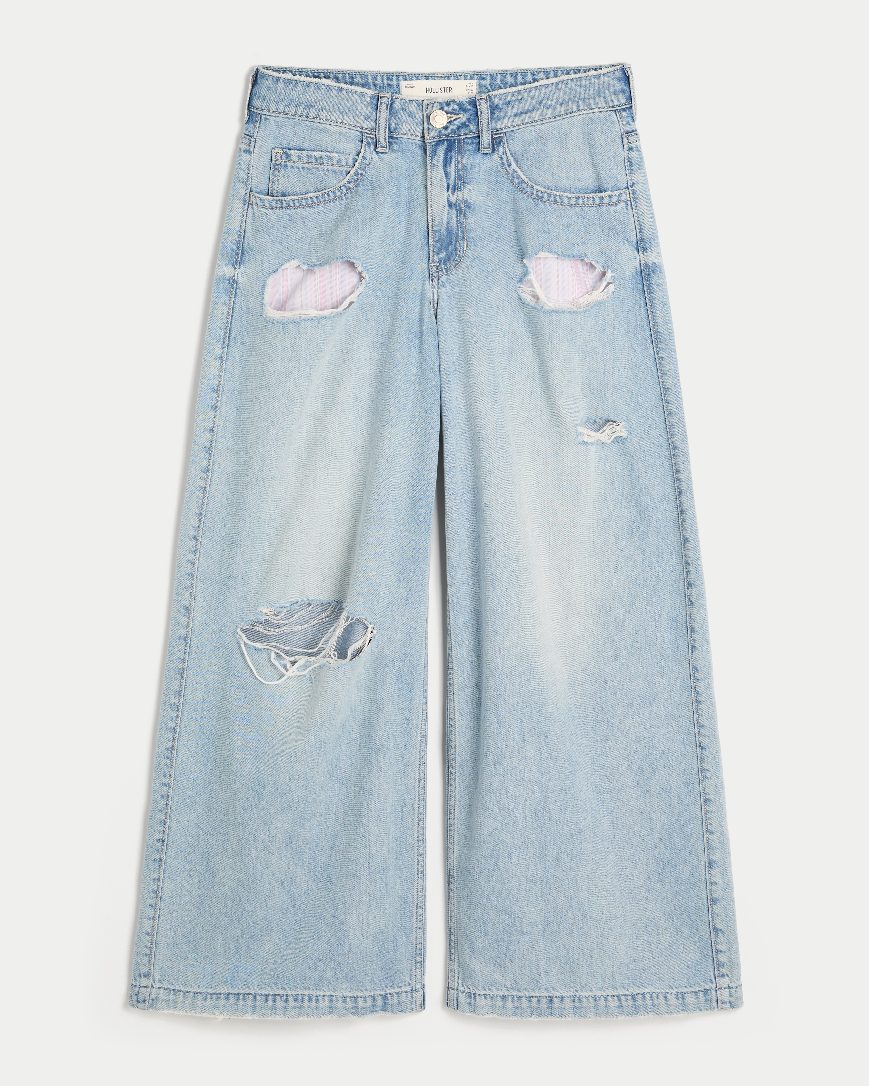 Женские джинсы Hollister Ultra Low-Rise Distressed Floral Graphic Drapey Beyond Baggy, цвет: Светлый — фото 1