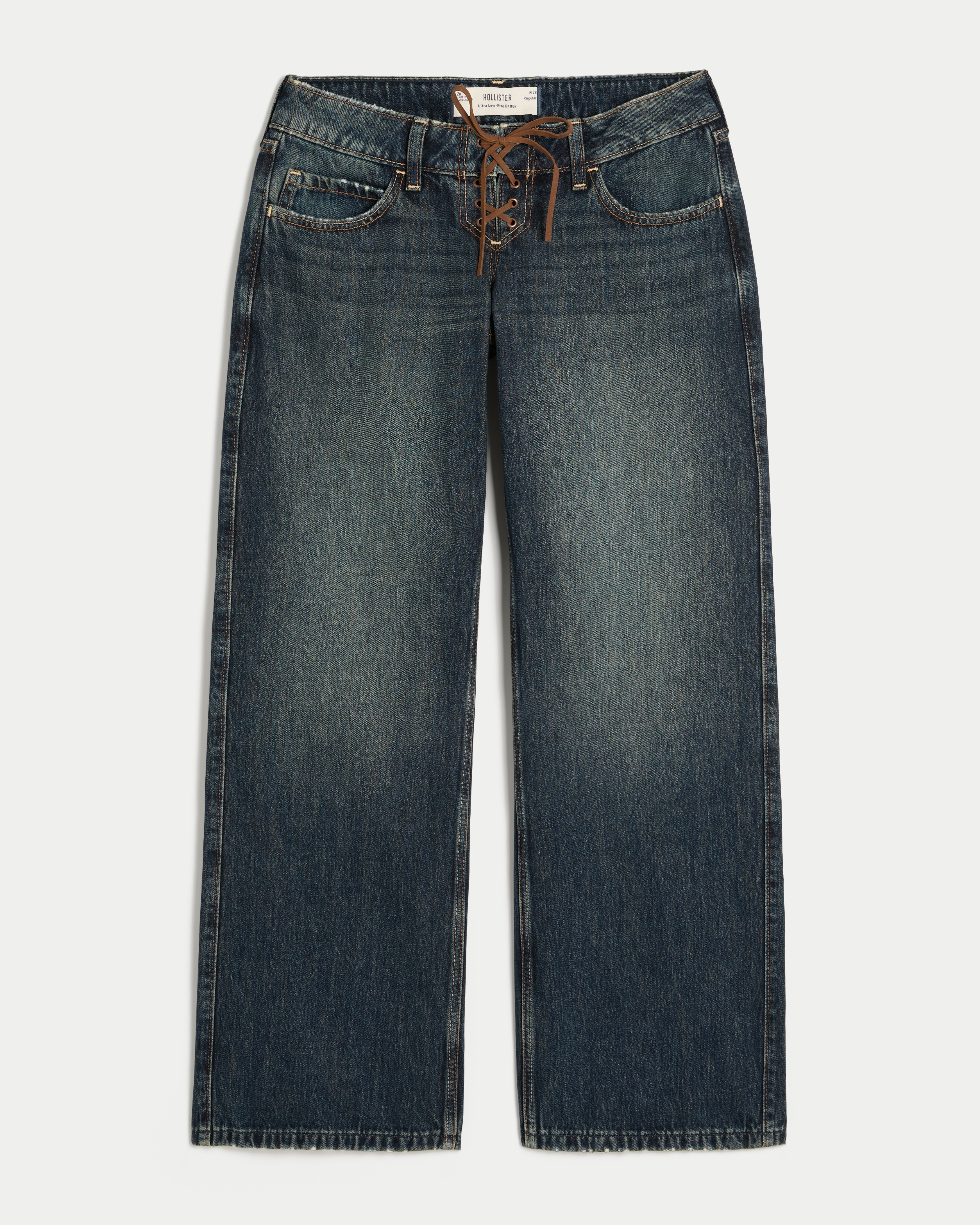 Женские джинсы Hollister Ultra Low-Rise Lace-Up Baggy, цвет: Тёмный — фото 1