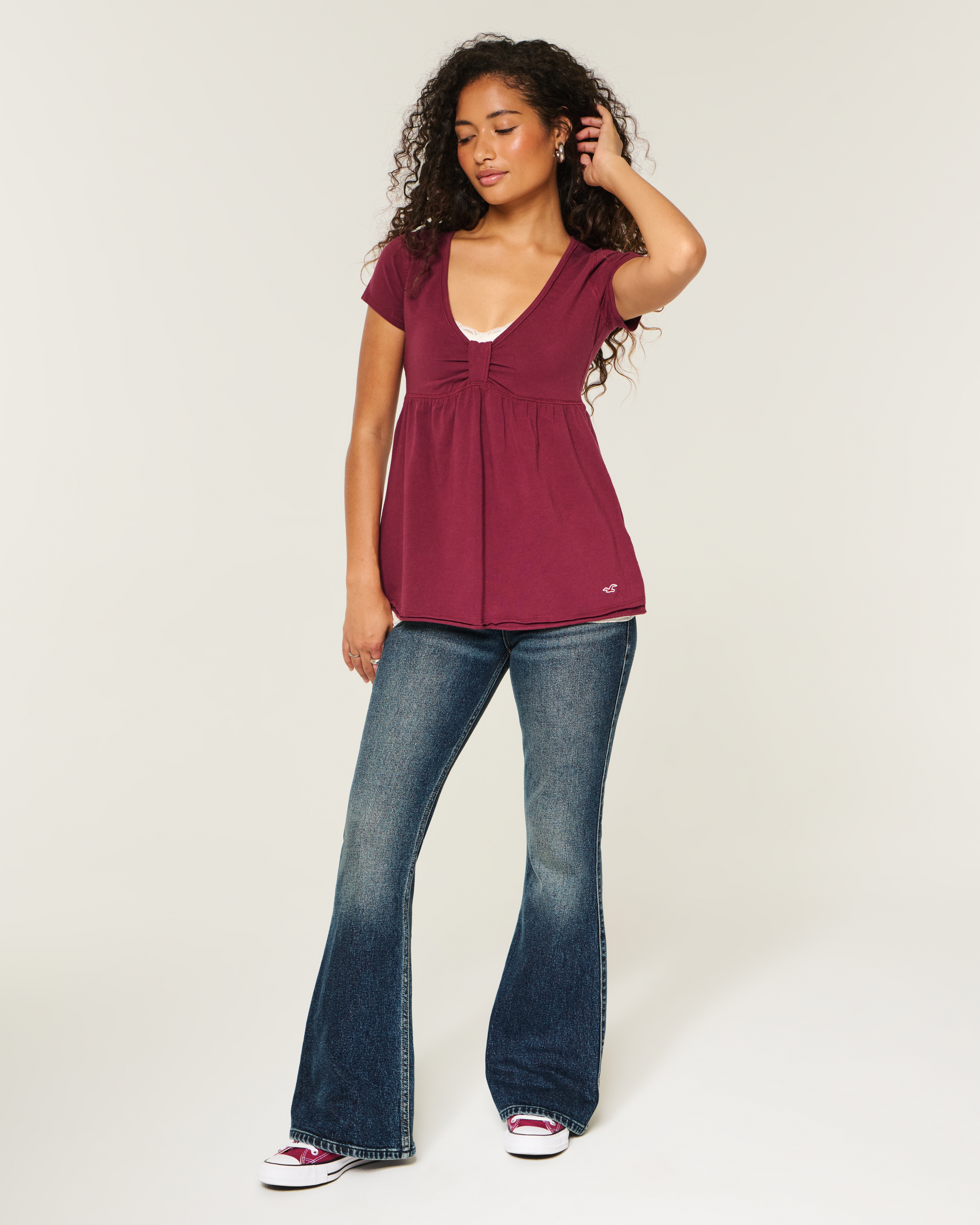 Женские джинсы Hollister Ultra Low-Rise Light Wash Floral Embroidery Flare Jeans — фото 2