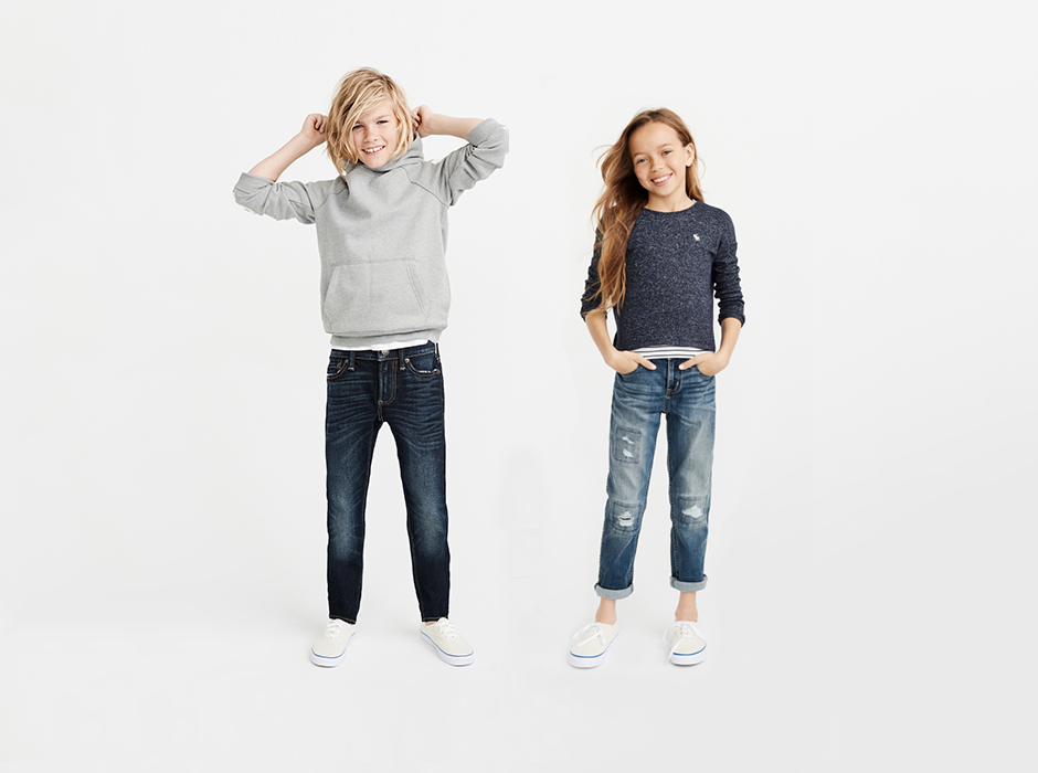 Boy and girl wearing abercrombie kids shirts and jeans